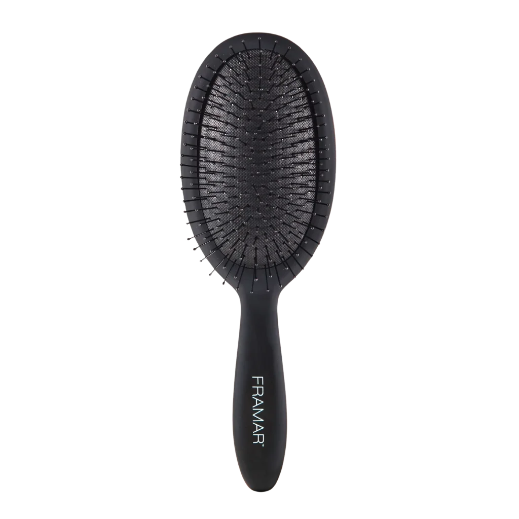 Framar Detangling Brush at MANEPRINT – a lightweight, ergonomic brush with flexible bristles designed to gently detangle wet or dry hair without pulling or damage.