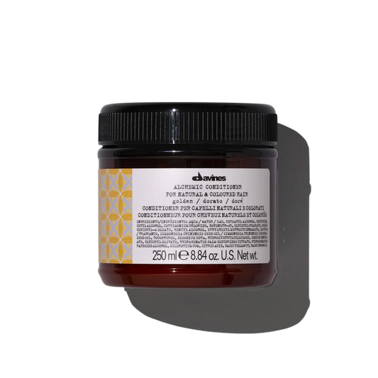 Davines ALCHEMIC Conditioner Golden - Color-enhancing Golden Hair Conditioner - Color-enhancing conditioner for golden-blonde to honey-blonde tones. Alchemic Conditioner Golden intensifies and illuminates these natural or colored blonde shades.