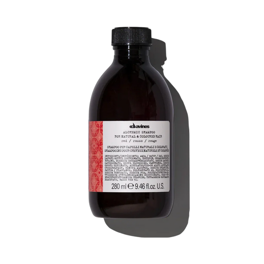 Davines ALCHEMIC Shampoo Red - Shampoo for Maintaining Red Hair - Color-enhancing shampoo for cool red tones. Alchemic Shampoo Red intensifies and illuminates these natural or colored cool red shades.