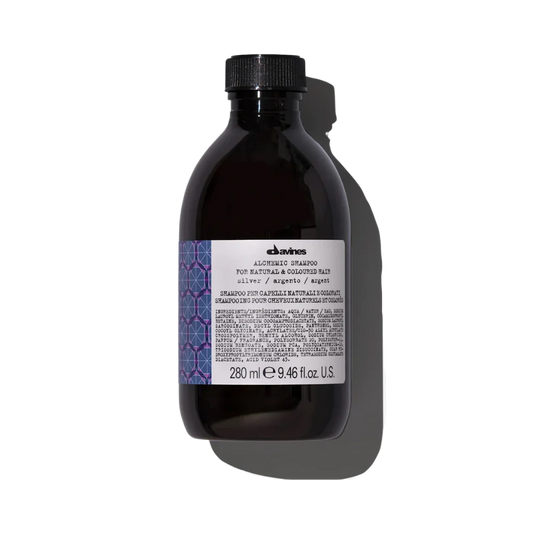 Davines ALCHEMIC Shampoo Silver - Shampoo for Silver-Toned Hair - Color-enhancing purple shampoo for platinum and cool blonde tones. Alchemic Shampoo Silver intensifies and illuminates these natural or colored blonde shades.