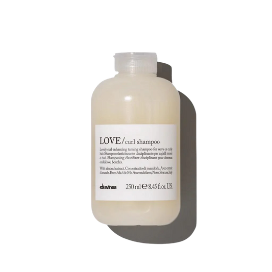 Davines LOVE CURL Shampoo - Curl enhancing shampoo for curly or wavy hair - Creamy shampoo to give elasticity to curly & wavy hair. The moisturizing formula cleanses the hair, makes it soft and light enhancing its volume and shine.