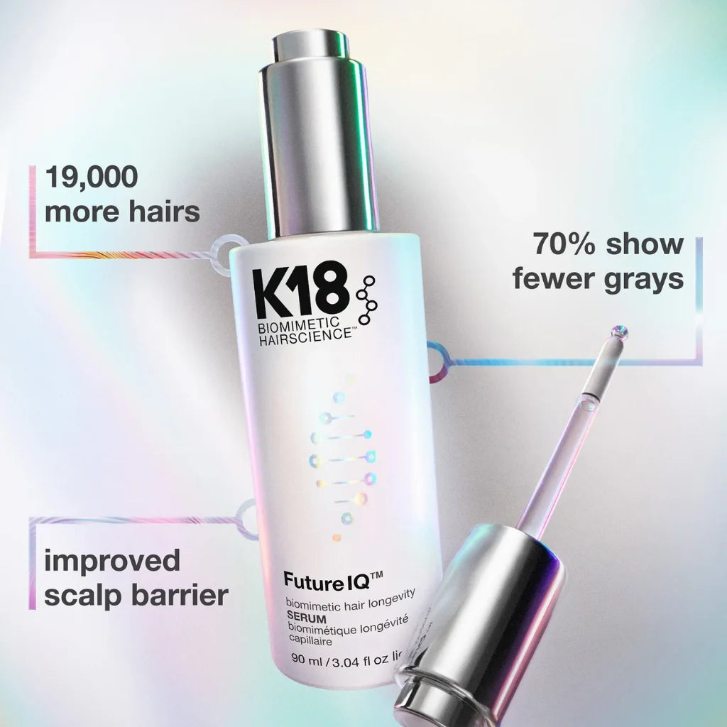 K18 Biomimetics Future IQ Hair Serum bottle with its applicator wand shown beside it on a light iridescent background, with marketing text callouts around the product. MANEPRINT