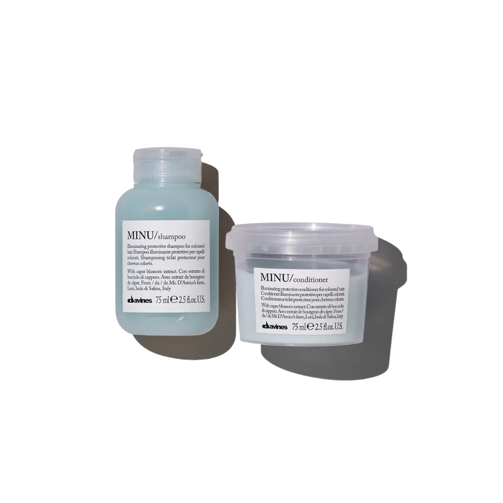 Elevate your color-treated hair with Davines Minu Shampoo & Conditioner Set. This dynamic duo enhances vibrancy, extends color life, and leaves your locks luminous. Treat your hair to the brilliance it deserves and shine on with Davines Minu. (2)