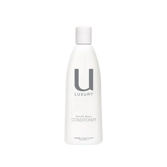 Unite U Luxury Conditioner is a lavish treat for your hair, enriched with nourishing ingredients such as argan oil, organic Hawaiian white honey, and shea butter to deeply moisturize and soften.