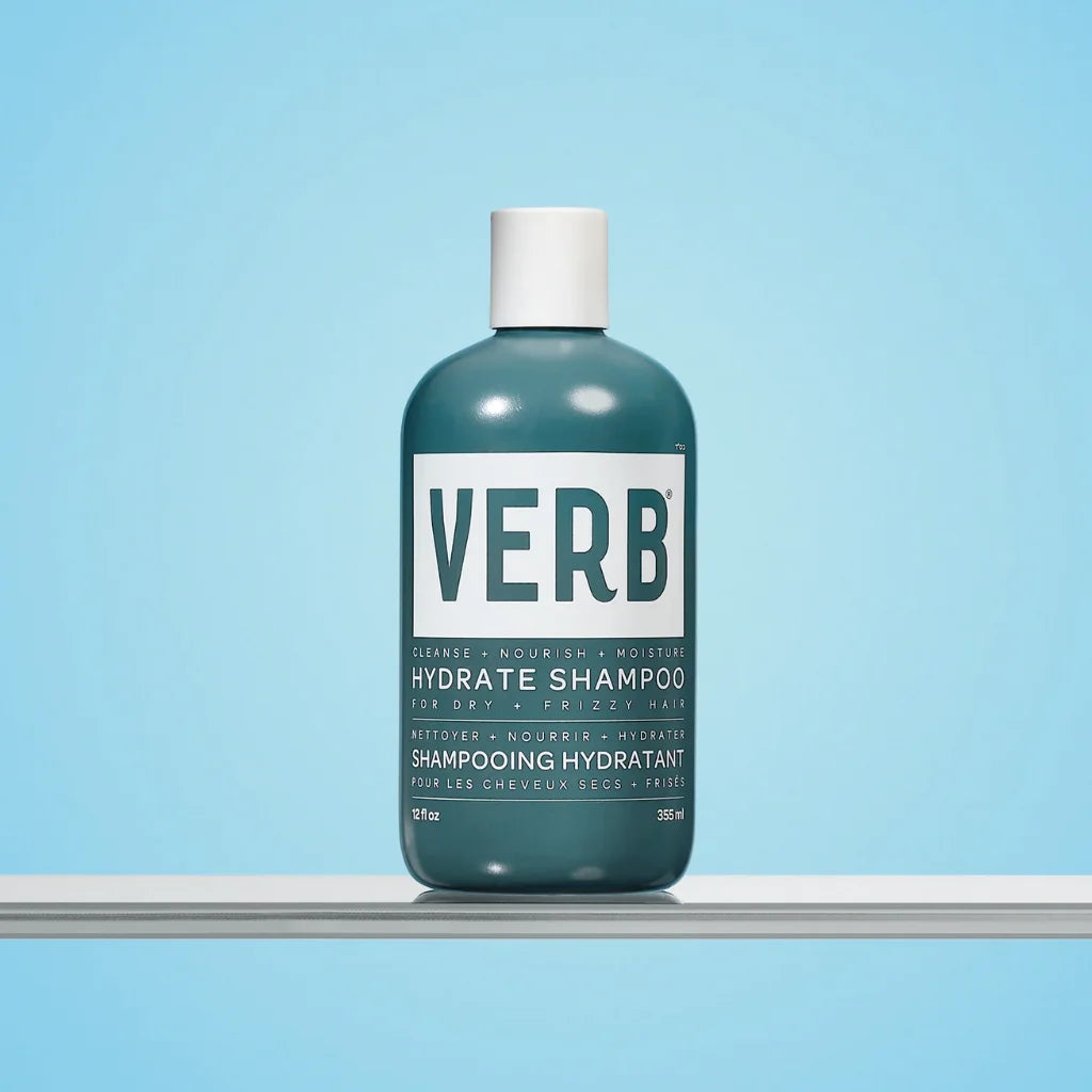 Verb shampoo bottle on a light blue background