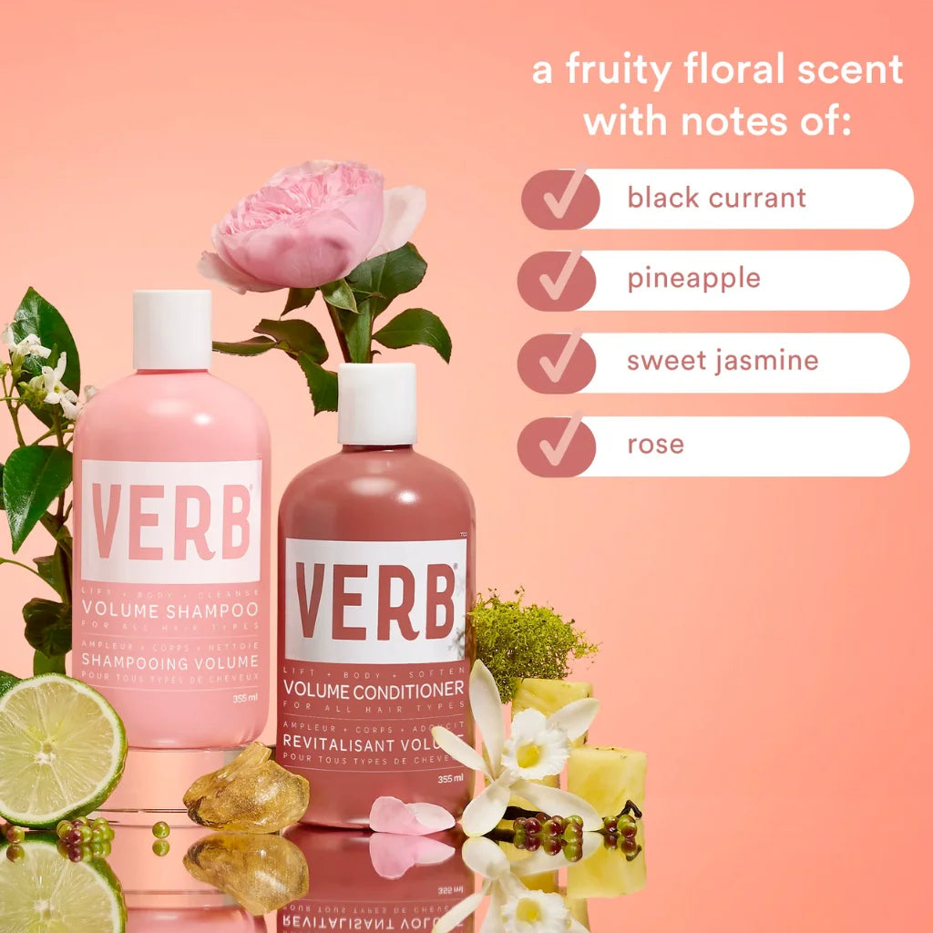 VERB shampoo and conditioner bottles with flowers and fruits on a pink background