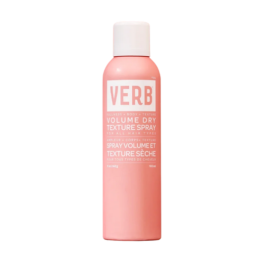 Pink bottle of VERB Volume Dry Texture Spray on a white background
