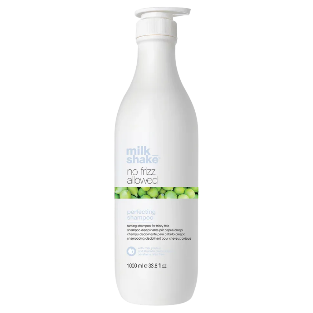A 1000 ml white pump bottle of Milk Shake No Frizz Allowed Perfecting Shampoo against a solid white background.