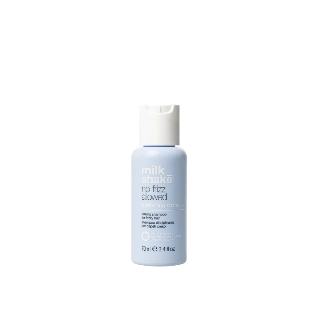 A 70ml bottle of Milk Shake No Fizz Allowed Toning Shampoo for fine hair, featuring a light blue bottle and a white cap, centered on a plain white background.
